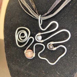 Artisan Hammered Stainless Steel Swirl Pendant with Rhodonite and Hematite Beads